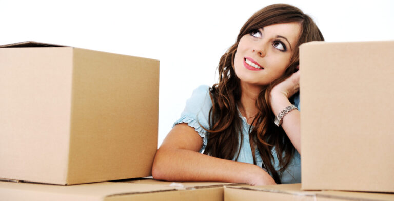 A professional Warrington Van Hire vehicle being loaded with boxes, illustrating practical home moving tips for a stress-free relocation.