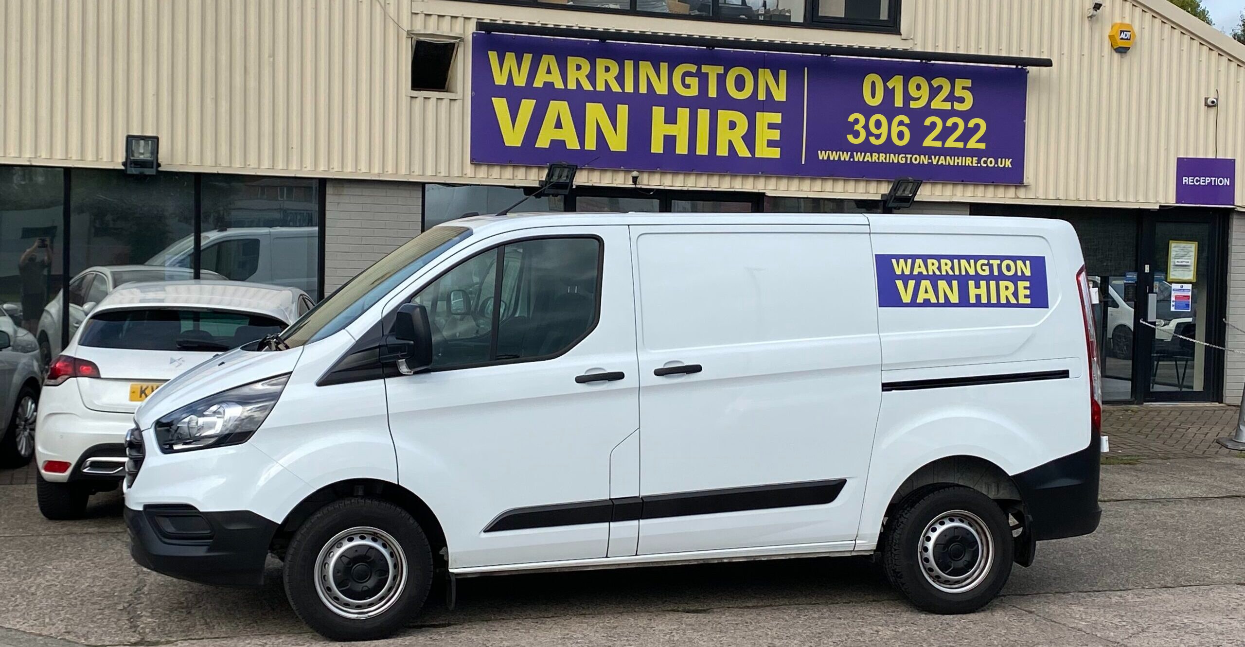 Independent van hire vehicle with its side door open at our Warrington depot