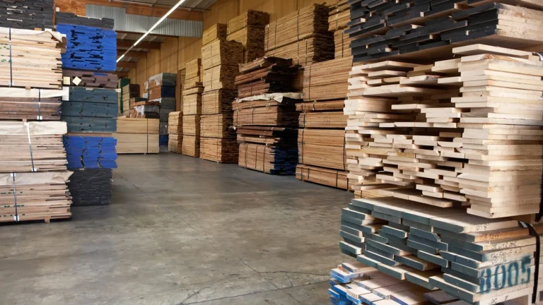 Timber stacks at a builders merchant | Warrington Van Hire | Central Warrington Van Hire | Call 01925 396 222 Stacks of timber in a merchant warehouse ready for a builders merchant collection