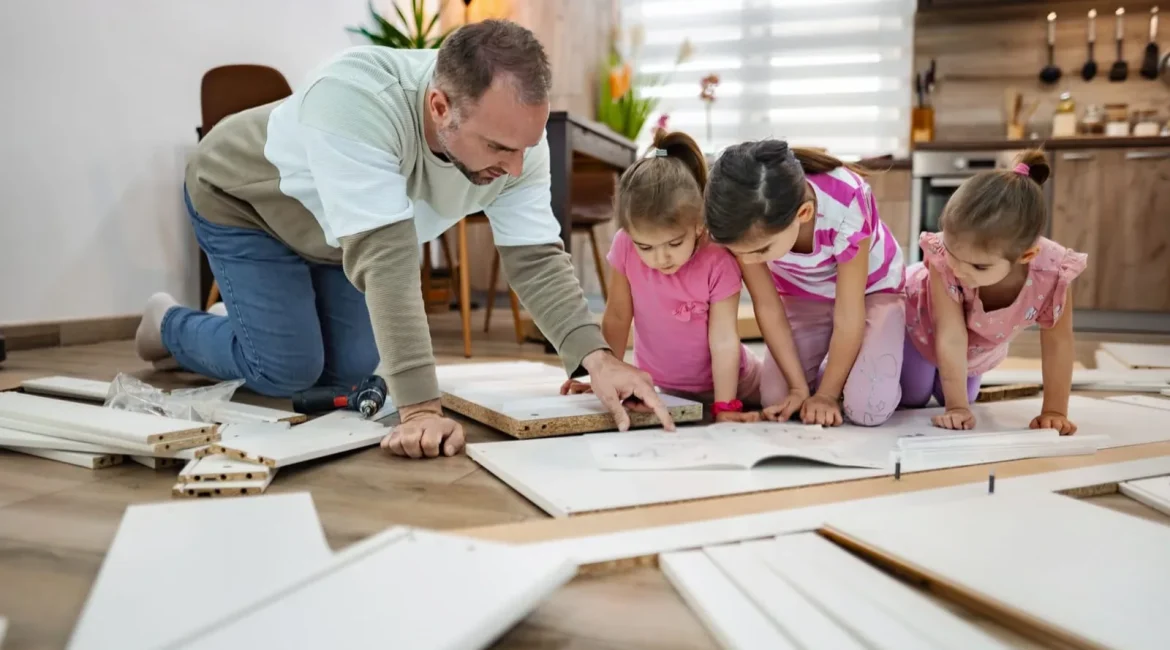 Family building flat-pack furniture together at home, a typical job for half term van hire